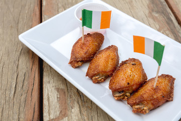 chicken wings on wooden table