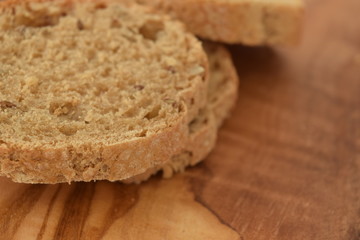 A slice of bread on a chopping board.