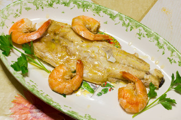 Tasty fish dish with shrimp