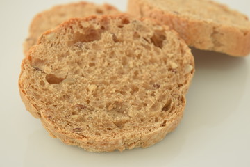 A slice of bread on a chopping board.