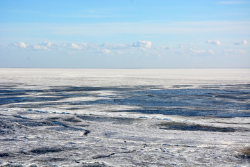 Naklejka na ściany i meble Frozen sea shore. View from the top