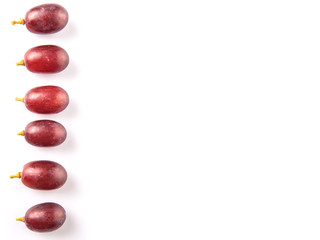 Red grapes over white background