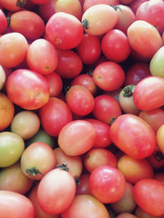 Fototapeta na wymiar Fresh Red cherry tomatoes background