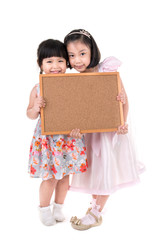 Portrait of Asian little girl hold wood board on white backgroun