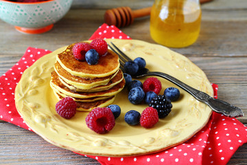 Pancakes with blueberries and raspberries