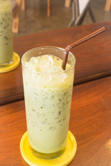 Glass of iced green tea latte