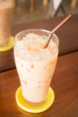 Glass of iced thai milk tea