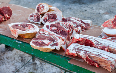 Raw chopped meat ready for sale in local market in winter
