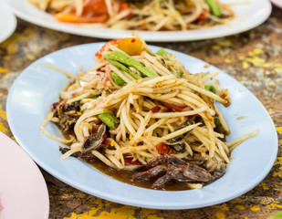 papaya salad with crab on table