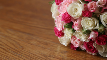 Wedding bouquet on wooden background