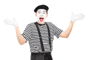 Mime artist gesturing joy with his hands