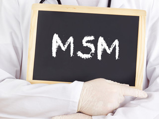 Doctor shows information on blackboard: MSM