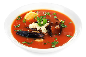 Tasty mussel soup isolated on white