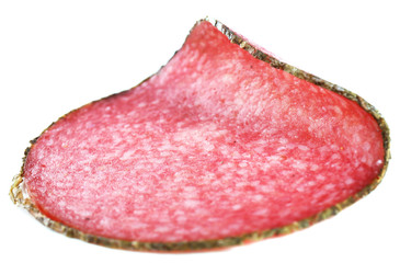 Slice of salami isolated on white background