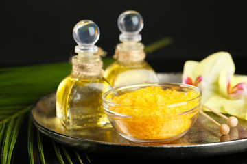 Beautiful spa composition with orchid on dark background