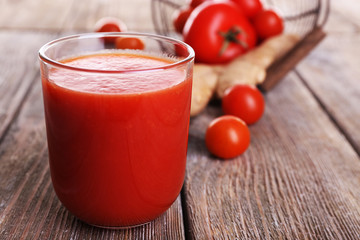 Glass of tomato juice with cherry tomatoes
