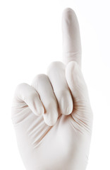 Doctor hand in sterile gloves showing sign, isolated