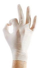 Doctor hand in sterile gloves showing sign, isolated