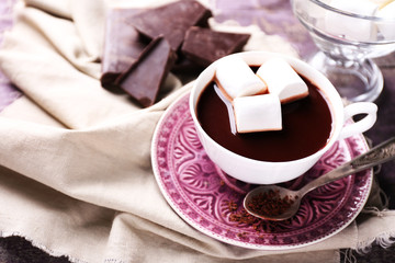 Hot chocolate with marshmallows in mug,