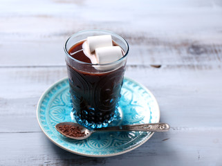 Hot chocolate with marshmallows in glass,