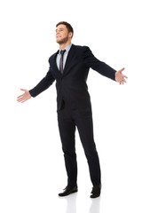 Successful businessman with open hands.