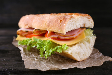 Fresh and tasty sandwich with ham and vegetables