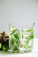 Glasses with fresh organic cucumber water