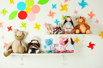 Obraz premium Shelves with toys in child room close-up