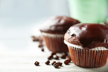 Tasty homemade chocolate muffins and cup of coffee