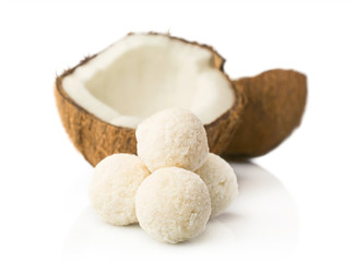 candies in coconut flakes and fresh coconut