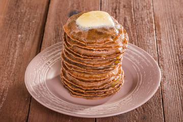 Homemade chocolate pancakes with butter