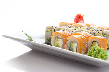Seafood Maki sushi in white plate isolated on white background