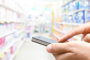 Close up of hands man using his cell phone