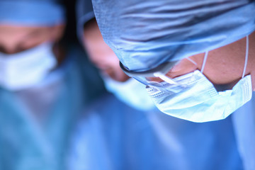 Team surgeon at work in operating