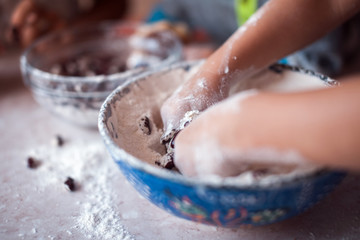 Girls hand in flour