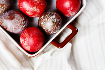 Easter eggs on textile draped background