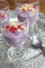 blueberry and raspberry chia pudding on silver plate