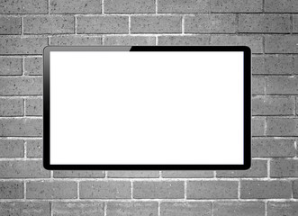 Blank screen LCD tv hanging on a wall - obrazy, fototapety, plakaty