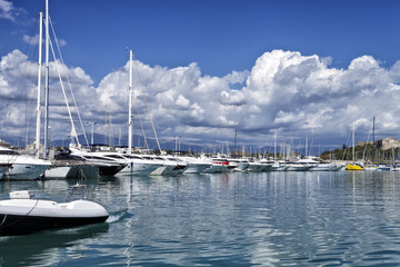 Fototapeta premium Luxury yachts and boats in a sea harbour