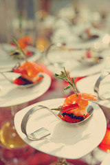 Sun-lit seafood snacks, toned
