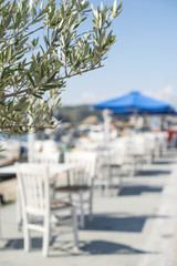 Typical greek restaurant and boat