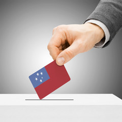 Voting concept - Male inserting flag into ballot box - Samoa