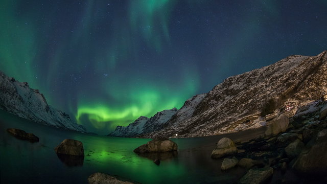 Northern Lights over fjords in Norway coast