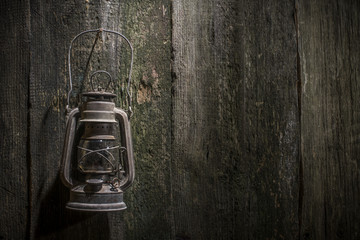 Old gas lantern on wood © Deyan Georgiev