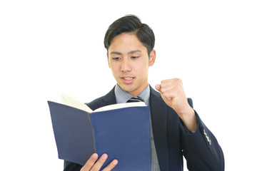 ガッツポーズのビジネスマン