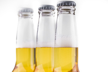 three bottles of beer isolated on white