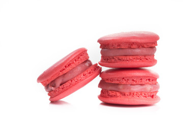 Tasty red macaroon isolate on with background