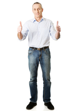 Mature man gesturing ok sign
