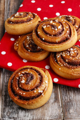 Swedish cinnamon buns on red dotted fabric