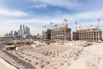 Construction site in the city of Dubai, United Arab Emirates - 78557264